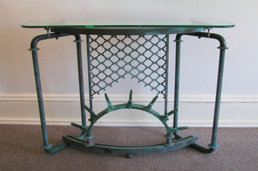 Glass topped console table with industrial base